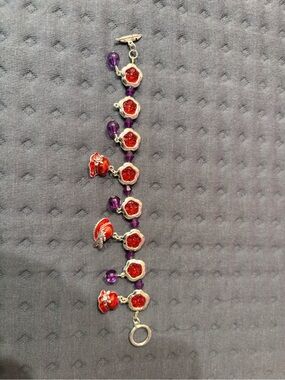 Red hat club novelty bracelet purple and red and silver